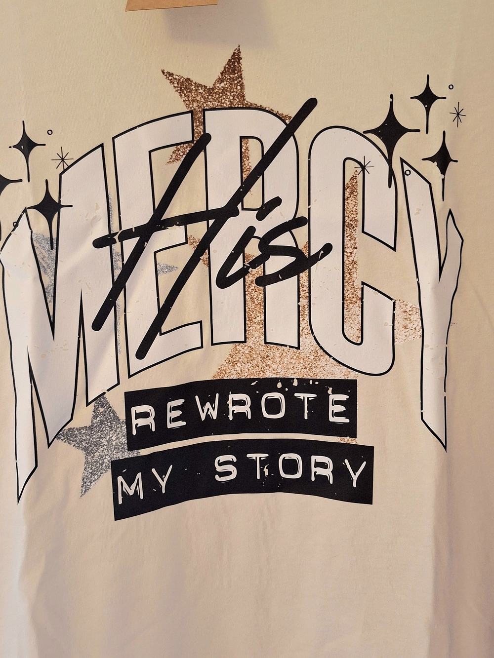 NWT Size M- Mercy Graphic Tee with Glitter Stars - White, Gold, Silver, Black